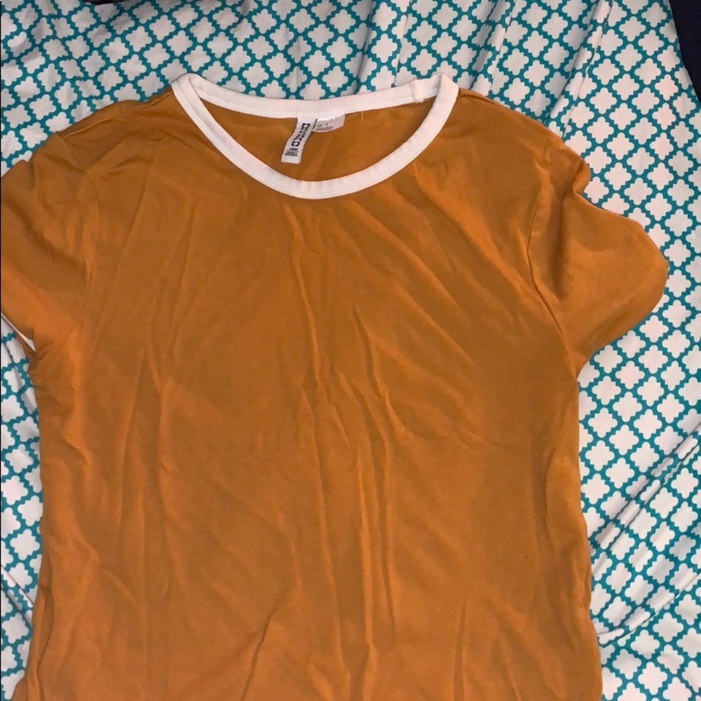 mustard yellow shirt